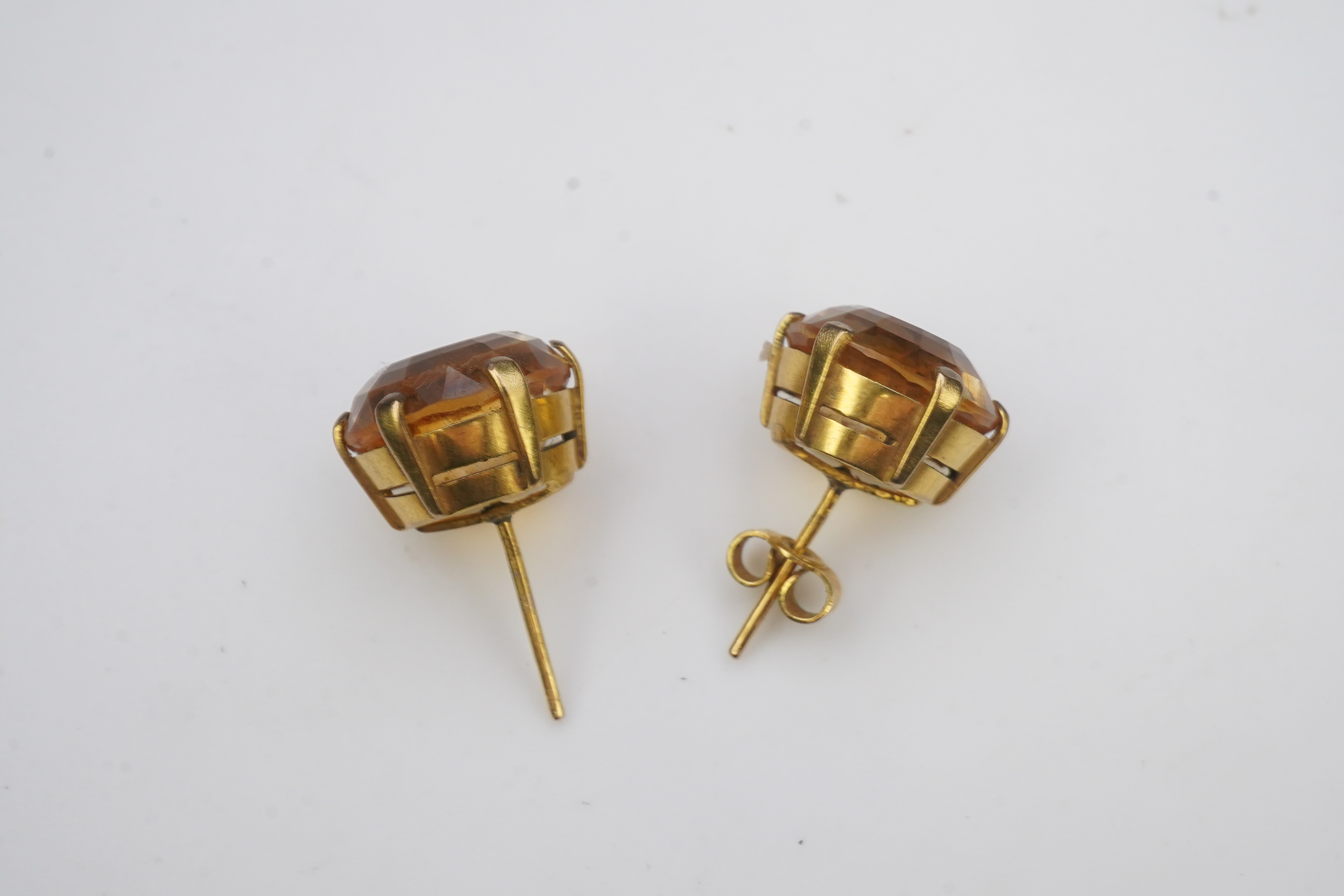 A pair of citrine ear studs